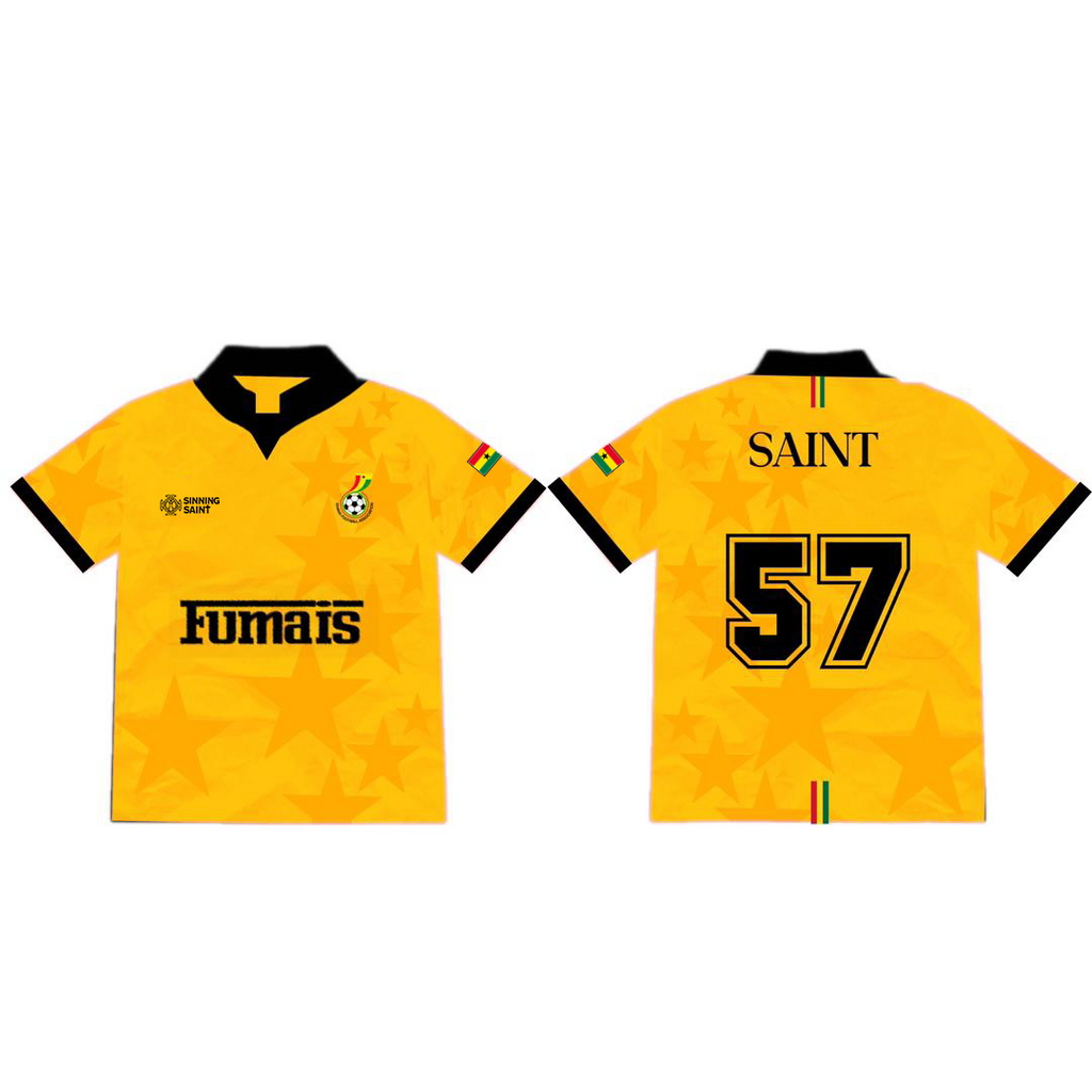 Front and back views of a yellow soccer jersey with black trim, featuring the name SAINT and number 57 on the back, and 'Fumais' sponsor text on the front.